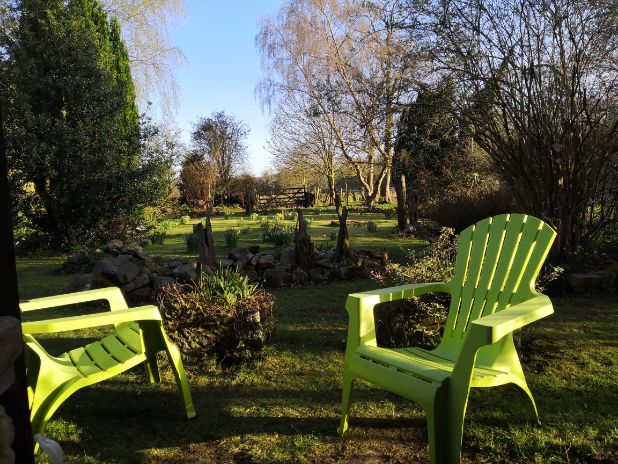 Green Adirondack chairs on Goytside front lawn