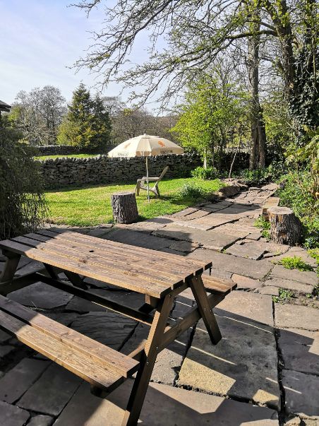 Stone patio and picnic bench